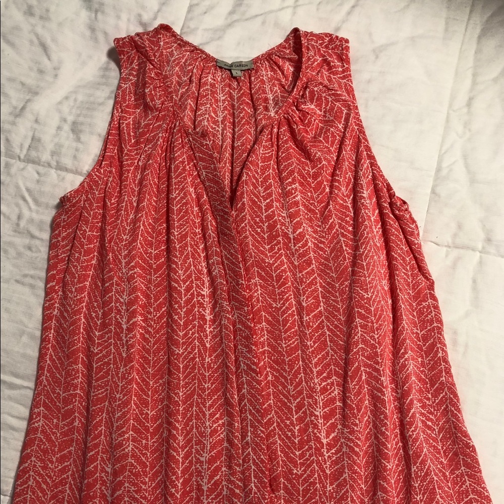 Coral sleeveless button-down blouse